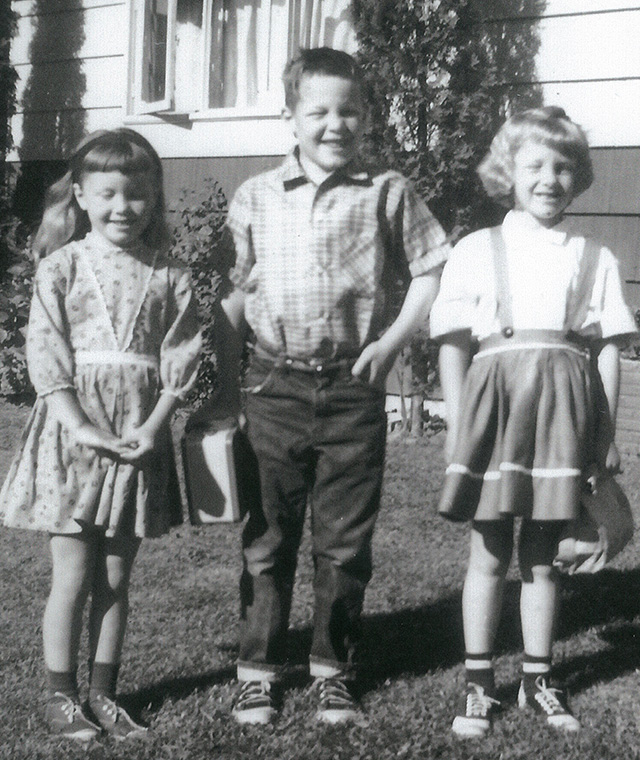 A black and white historical image of children at Coach Corral.